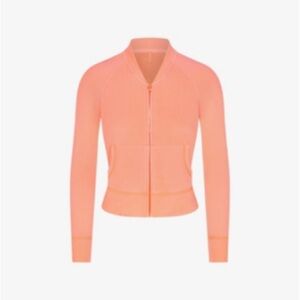 NWT Skims Light French Terry Shrunken Zip Up in Neon Orange Size XS